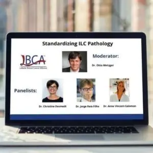 Photo of computer with Standardizing ILC Pathology slide showing
