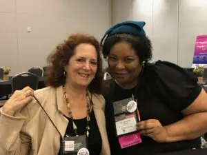 LBCA Exec Director Laurie Hutcheson and ILC Advocate Megan-Claire Chase at SABCS22.