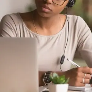 Woman looking at laptop